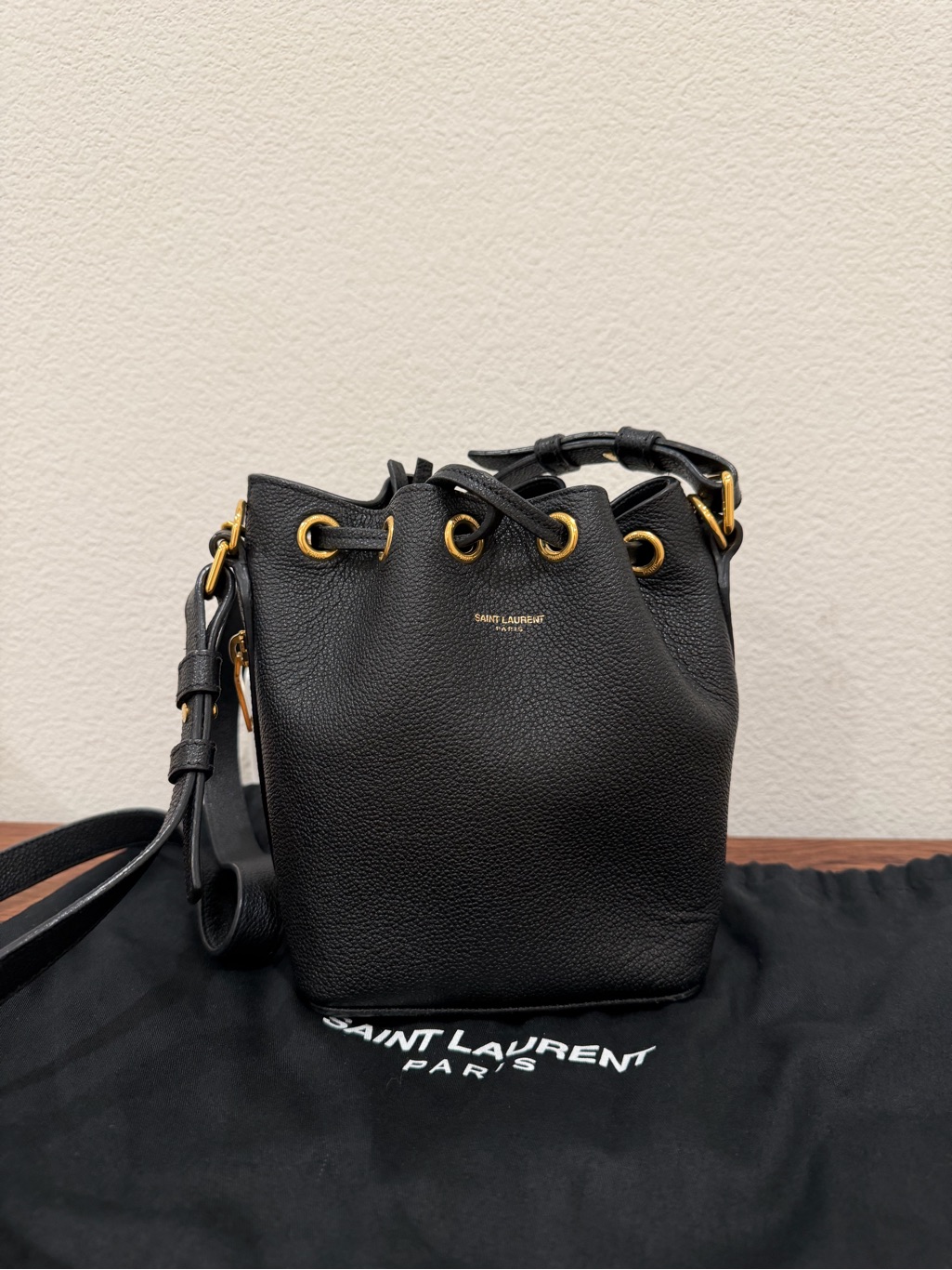 Saint Laurent Black Pebbled Leather Drawstring Crossbody With Gold-Tone Hardware